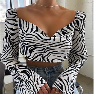 Wild getaway zebra top